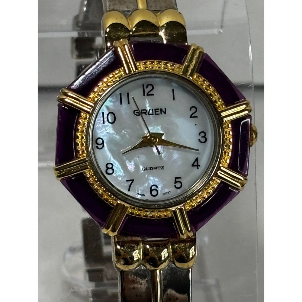 Gruen GR7183 purple bezel MOP dial bangle women's watch, running